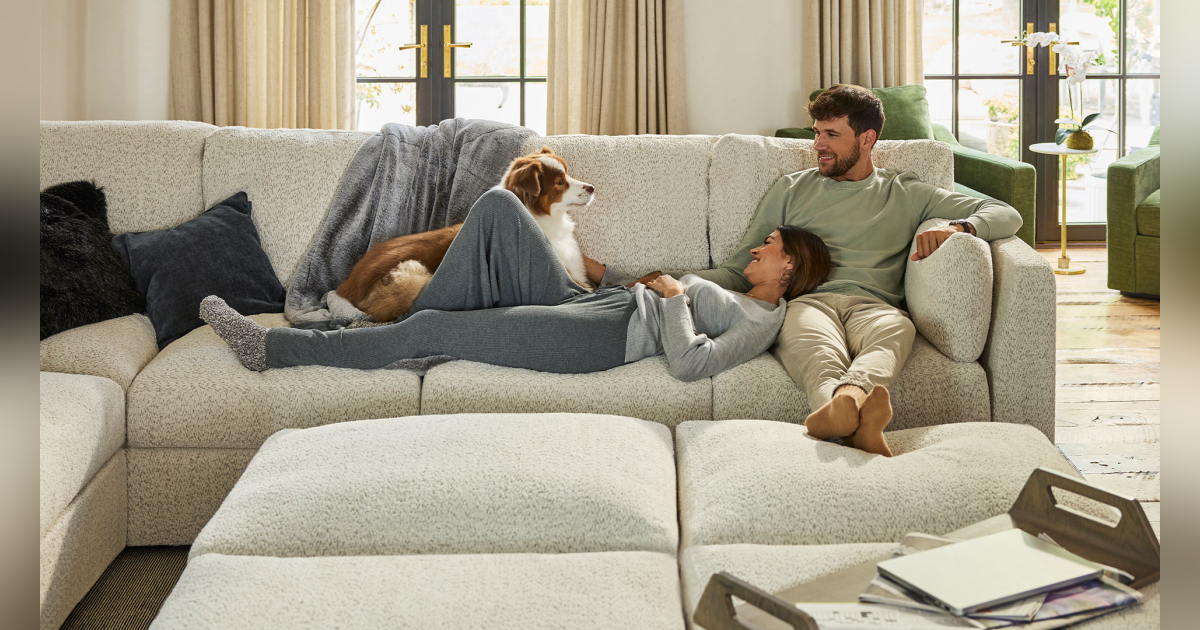 people laying on lovesac couch