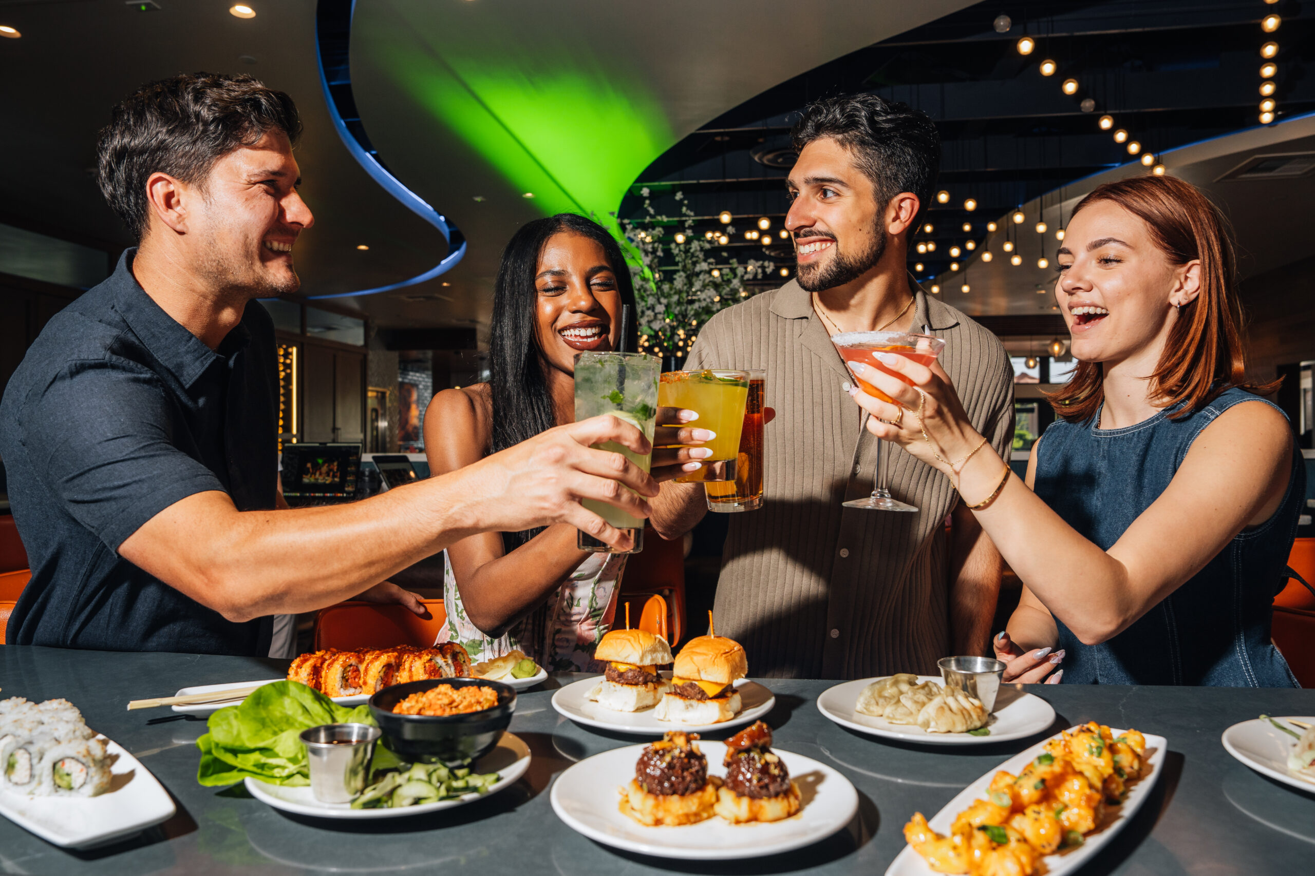 Guests enjoying happy hour at Kona Grill